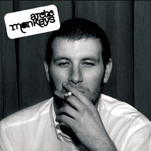 Black and white album cover with a person smoking, featuring the band ' Arctic Monkeys' logo.