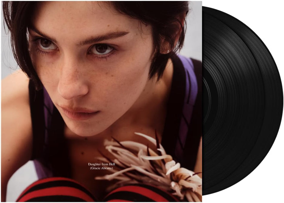 The album cover artwork for Gracie Abrams', Daughter From Hell LP. Displaying a portrait of Gracie with a close up of her face.