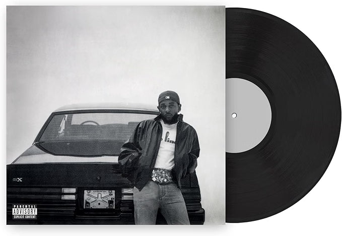 Vinyl record with a black and white portrait of Kendrick standing at the back of an American car, featuring a 'Parental Advisory' label.