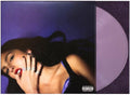 The vinyl record album cover for GUTS featuring a Olivia lying down against a purple background, with a translucent lavender record partially visible on the right. A Parental Advisory label appears at the bottom right.