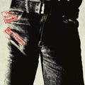 Album cover of 'The Rolling Stones' featuring a person wearing jeans with text overlay.
